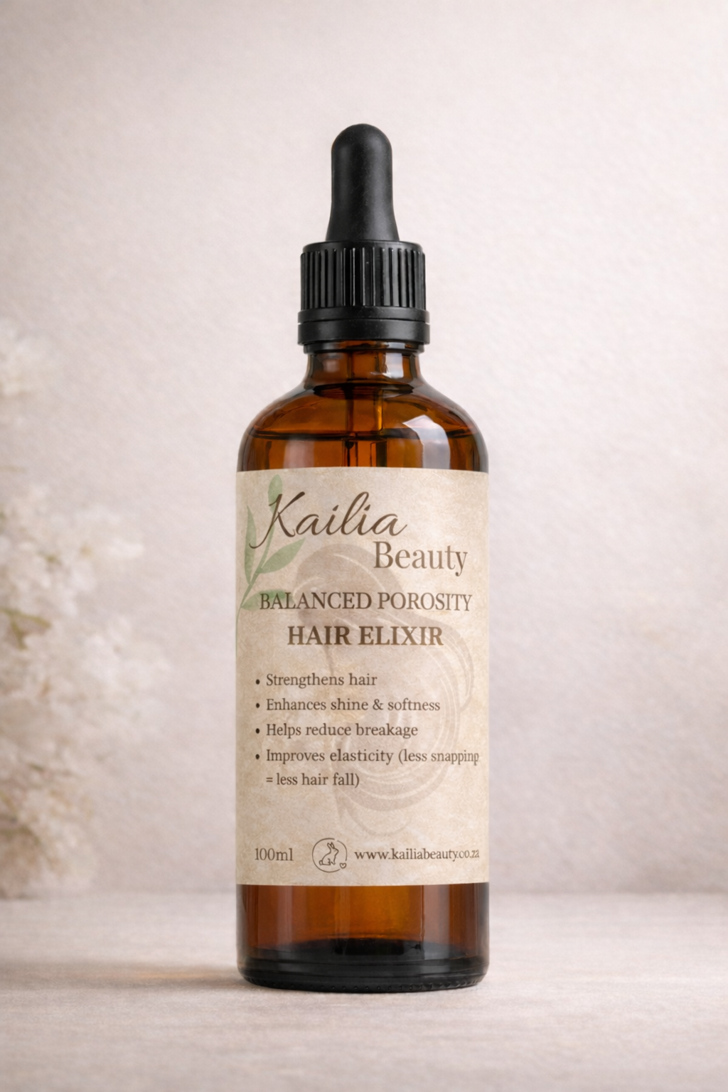 Kailia Beauty Hair Elixir bottle on a neutral background